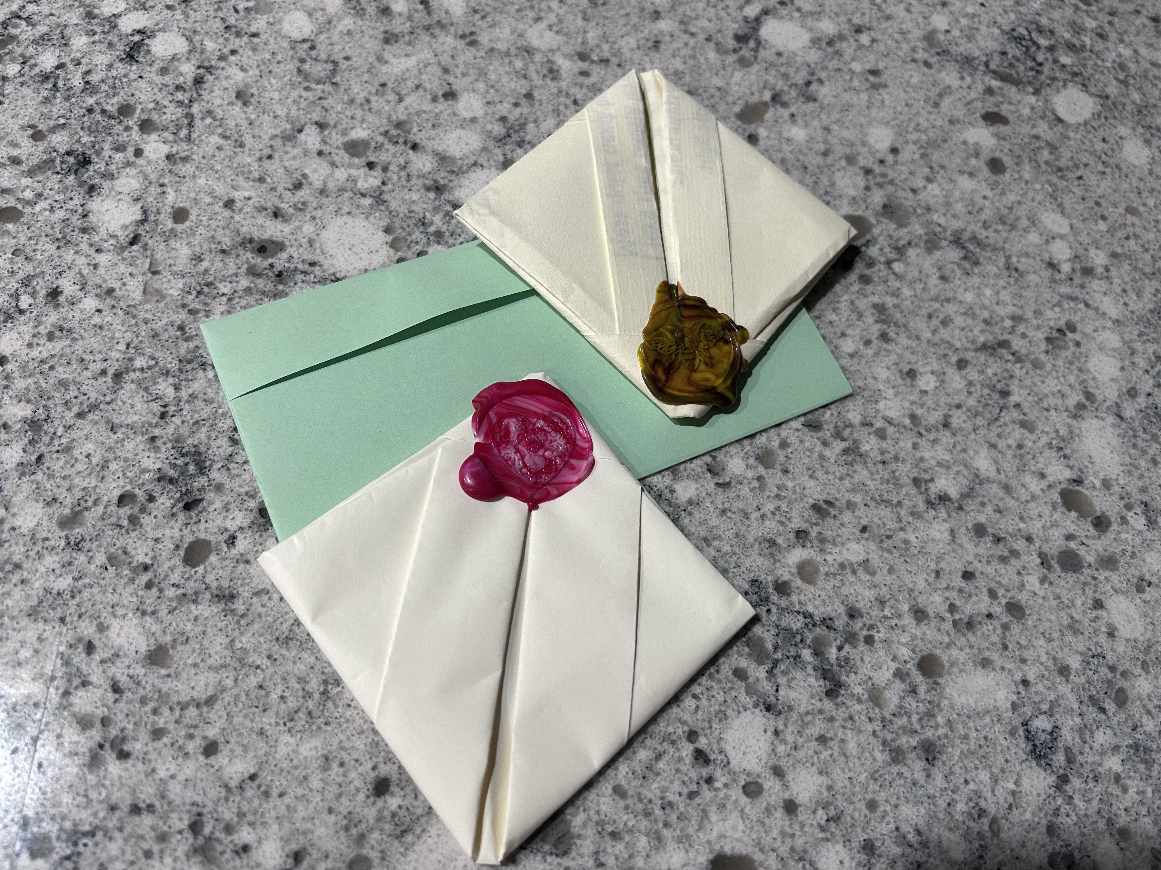 Close-up view of folded letterlocking structures